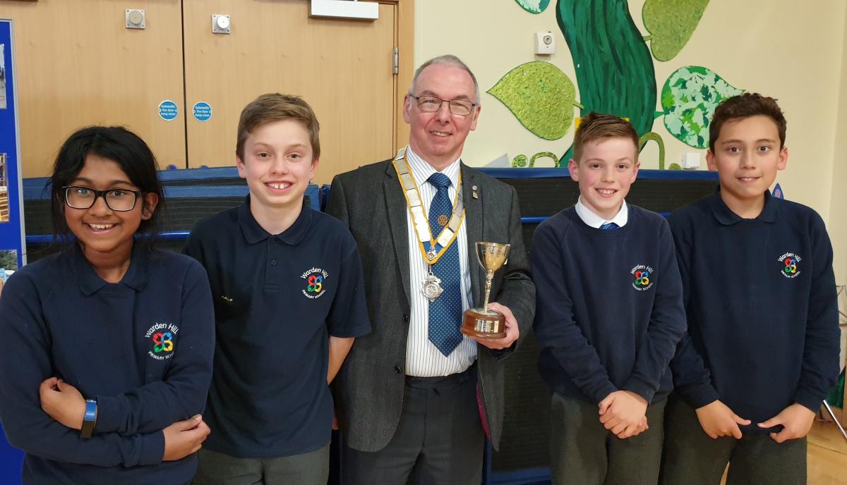 Primary School Quiz 2019 - President Simon presenting cup to Warden Hill
