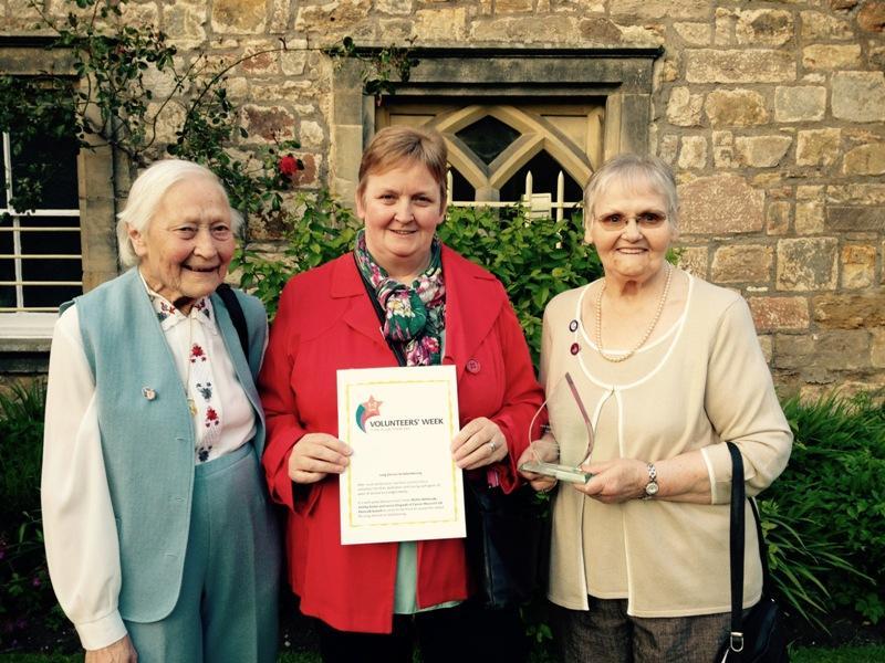News Archive - Esk Valley award for long service to volunteering presented to Penicuik Cancer Research shop assistants June 2015
