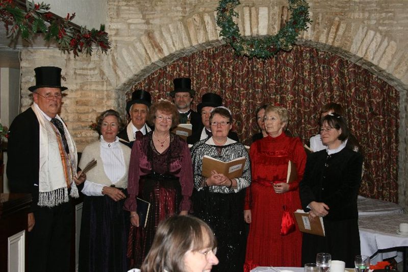Chrismas Dinner 2010 - A selection of traditional carols were sung by our Victorian clad entertainers.