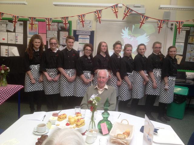 Afternoon tea at Redborne School - The hospitality students with Peter Mears celebrating his 90th birthday