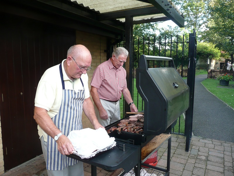  40 years of Rotary in Chatteris - rotarians getting agood grilling