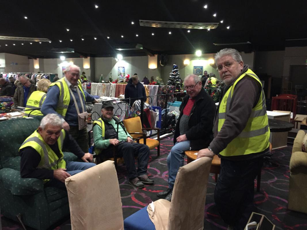 Shanklin Rotary Sale 2017 - Hard Working Rotarians testing out the Furniture