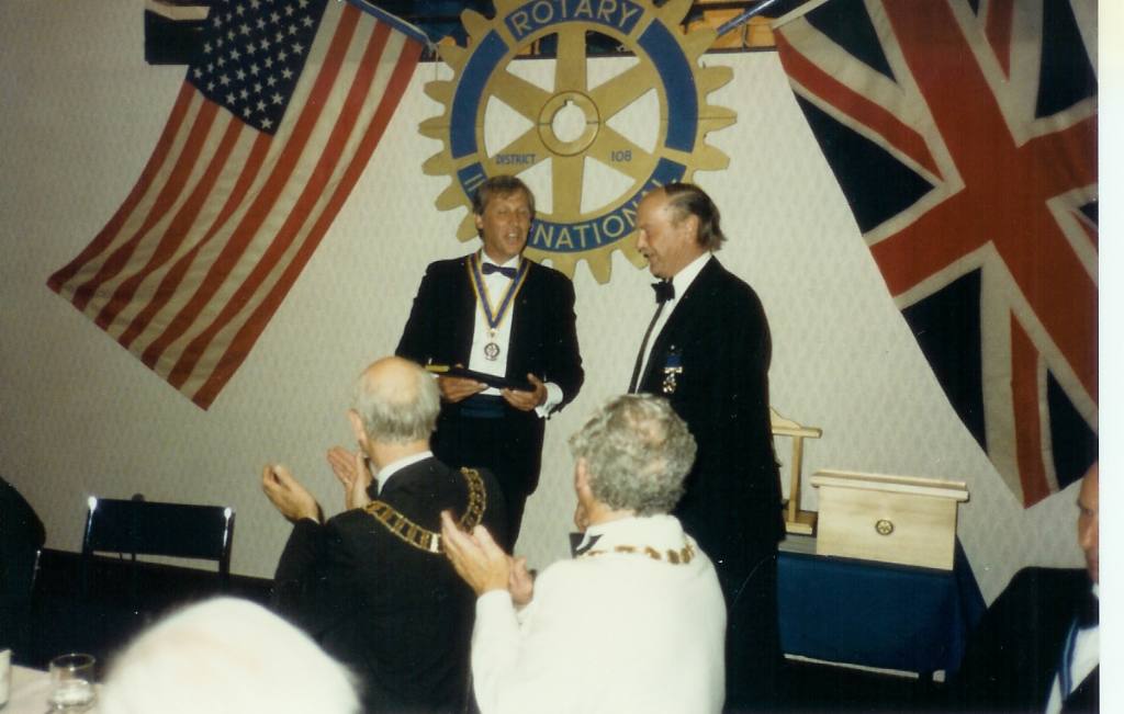 Charter Ceremony 1989 - Roger receives the Club's visitors' book from Rtn. Geoff Bullen