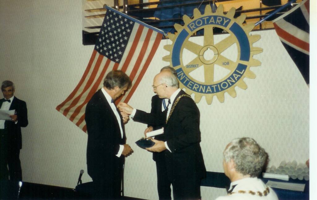 Charter Ceremony 1989 - Roger receives his Rotary badge from District Governor Dick Jeffery