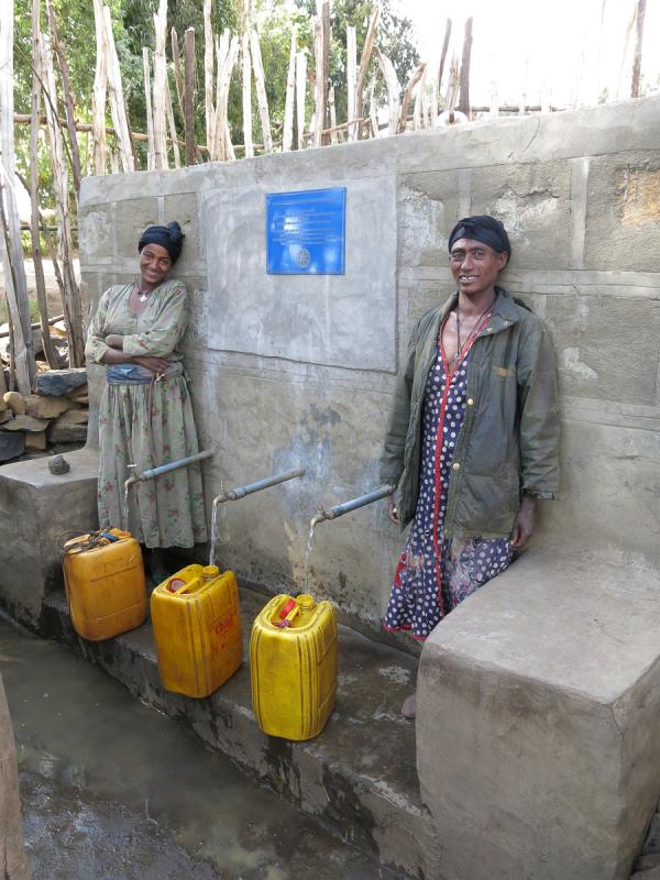 International Service - The capped spring feeds a water tank with taps