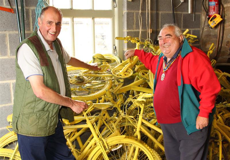 Yellow Bikes go to Charity for Recycling  - President Phil Oliver and Rtn Tim Raw