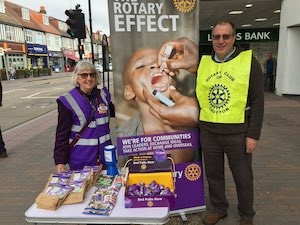 DG Brenda Parsons & Keith Hickey selling purple crocus pins in Orpington